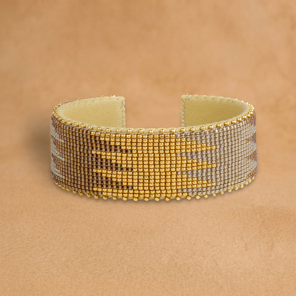 Aasha Large beaded cuff, bronze, silver and gold beads in a flame pattern, handloomed by Navajo artisans in New Mexico
