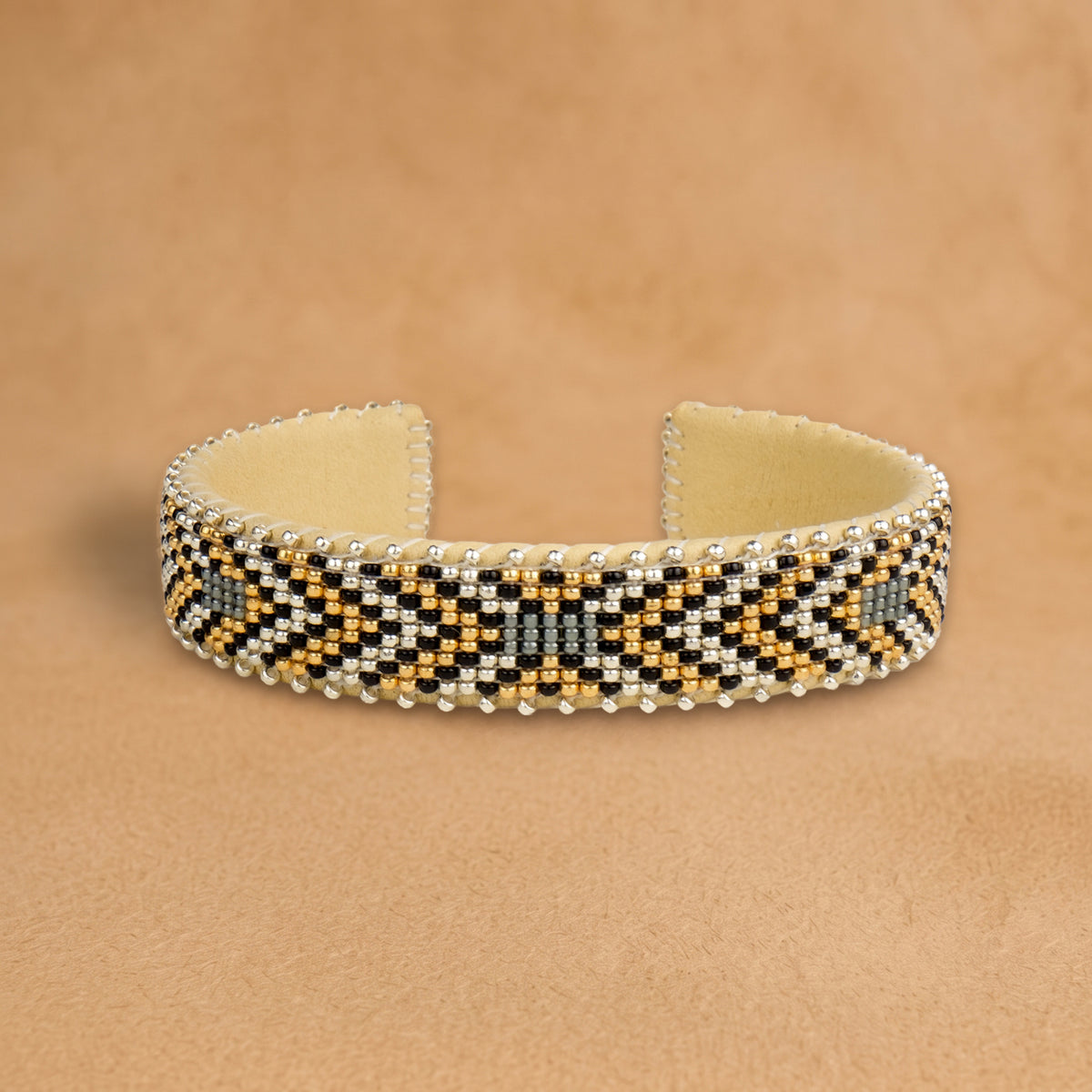 Alice Small beaded cuff, black, gold, white and sage chevrons, handloomed by Navajo artisans in New Mexico
