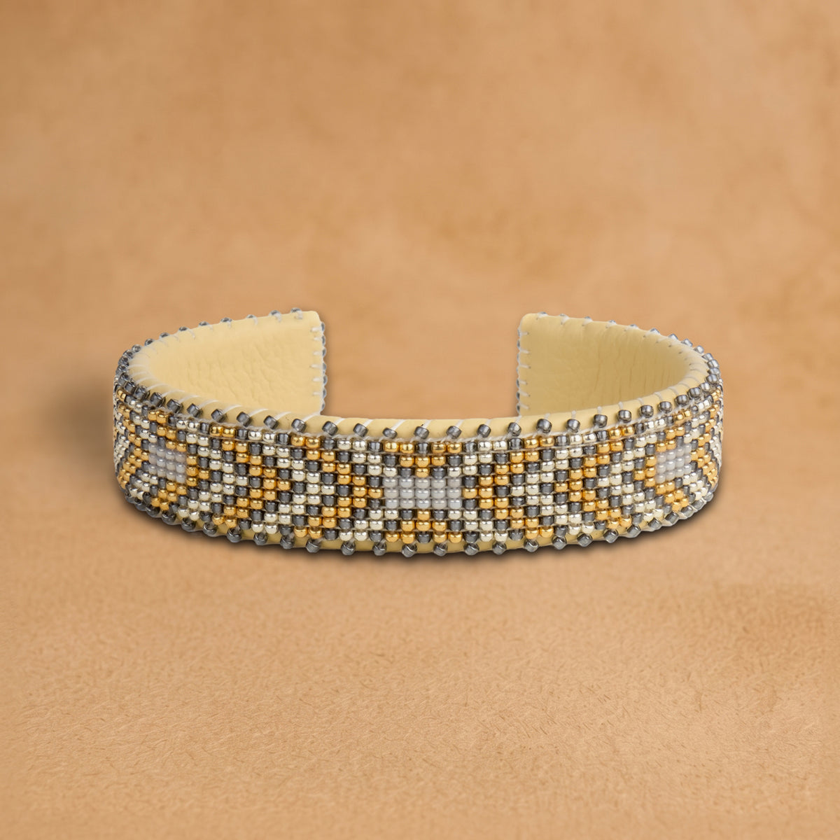 Andrea Small beaded cuff, silver, grey and gold chevrons, handloomed by Navajo artisans in New Mexico