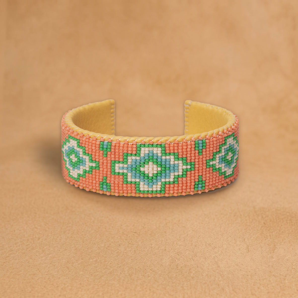 Cora Large beaded cuff, coral with turquoise, green and white stepped diamonds, handloomed by Navajo artisans in New Mexico