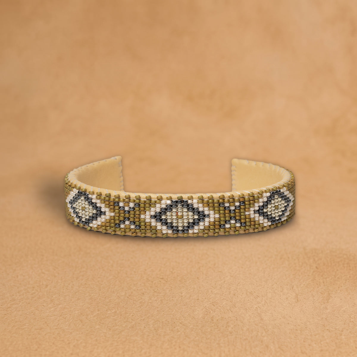 Forest Small beaded cuff, olive green with white, silver and charcoal diamonds, handloomed by Navajo artisans in New Mexico