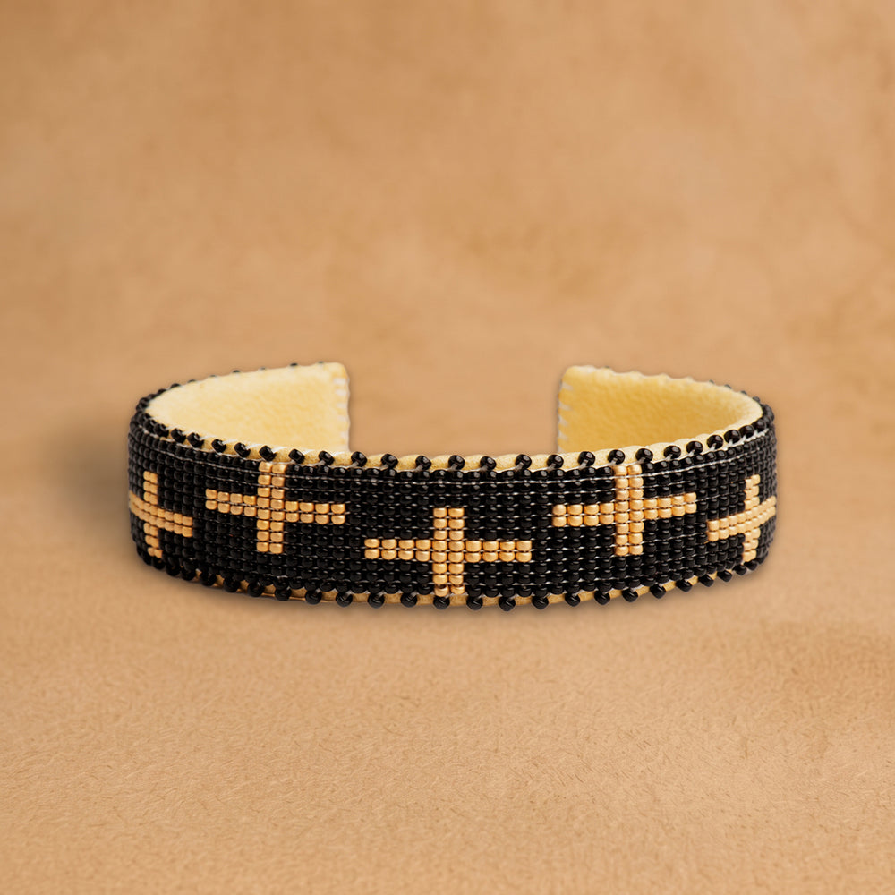 Honor Medium 7 inch beaded cuff, black with peach crosses, handloomed by Navajo artisans in New Mexico