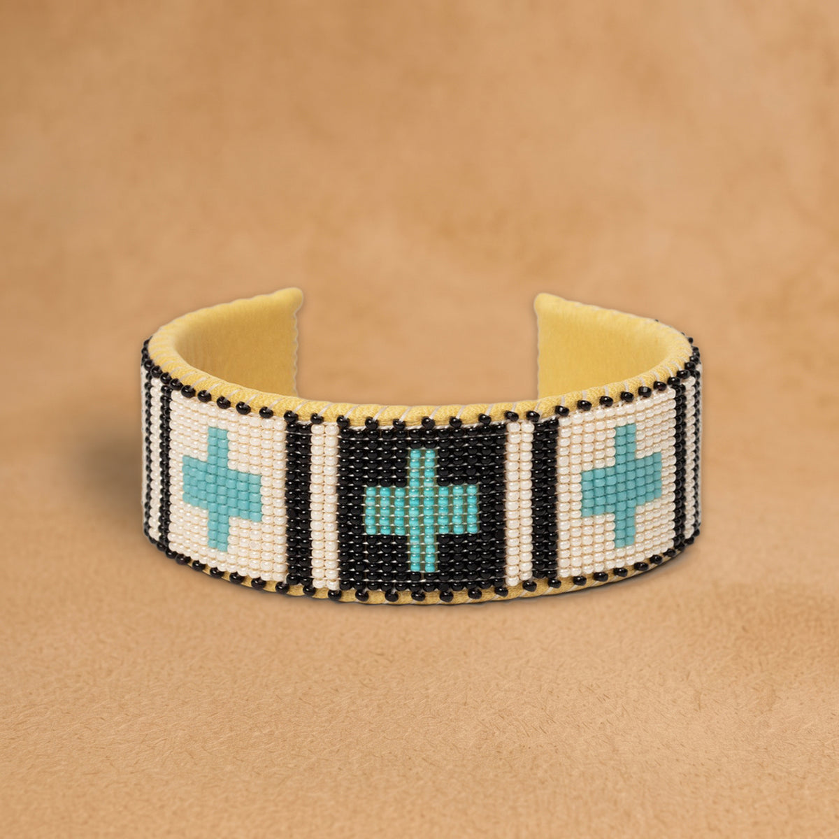 Jaclyn Large beaded cuff, white and black panels with turquoise crosses, handloomed by Navajo artisans in New Mexico