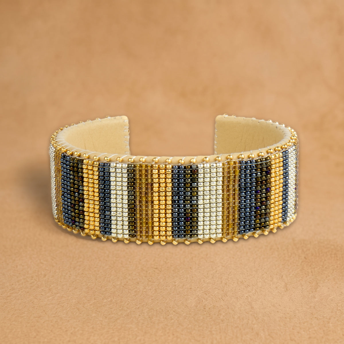 Jordan Large beaded cuff, vertical stripes in gold, navy, cream and black, handloomed by Navajo artisans in New Mexico