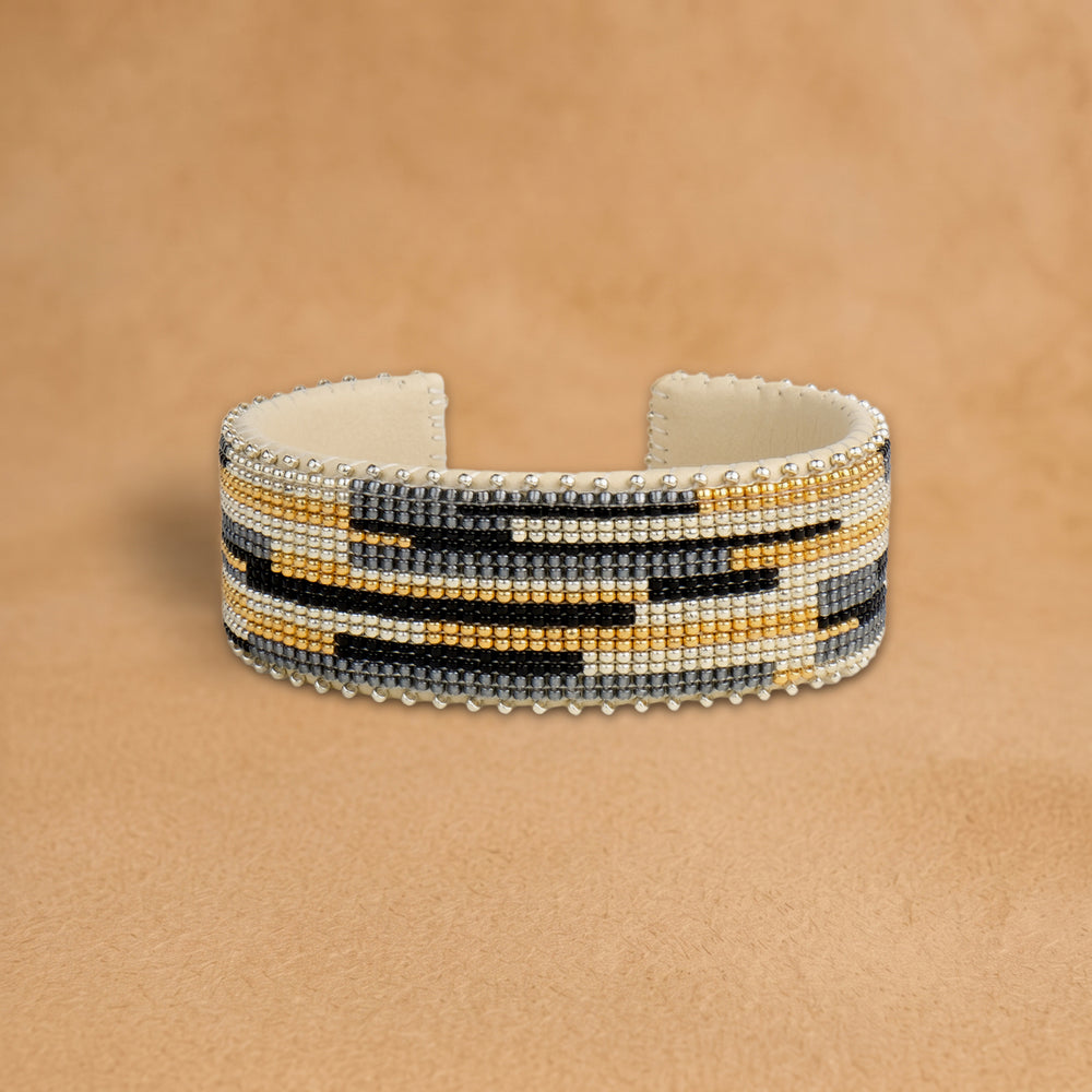 Kalani Large beaded cuff, cream, gold, black and grey offset bars, handloomed by Navajo artisans in New Mexico