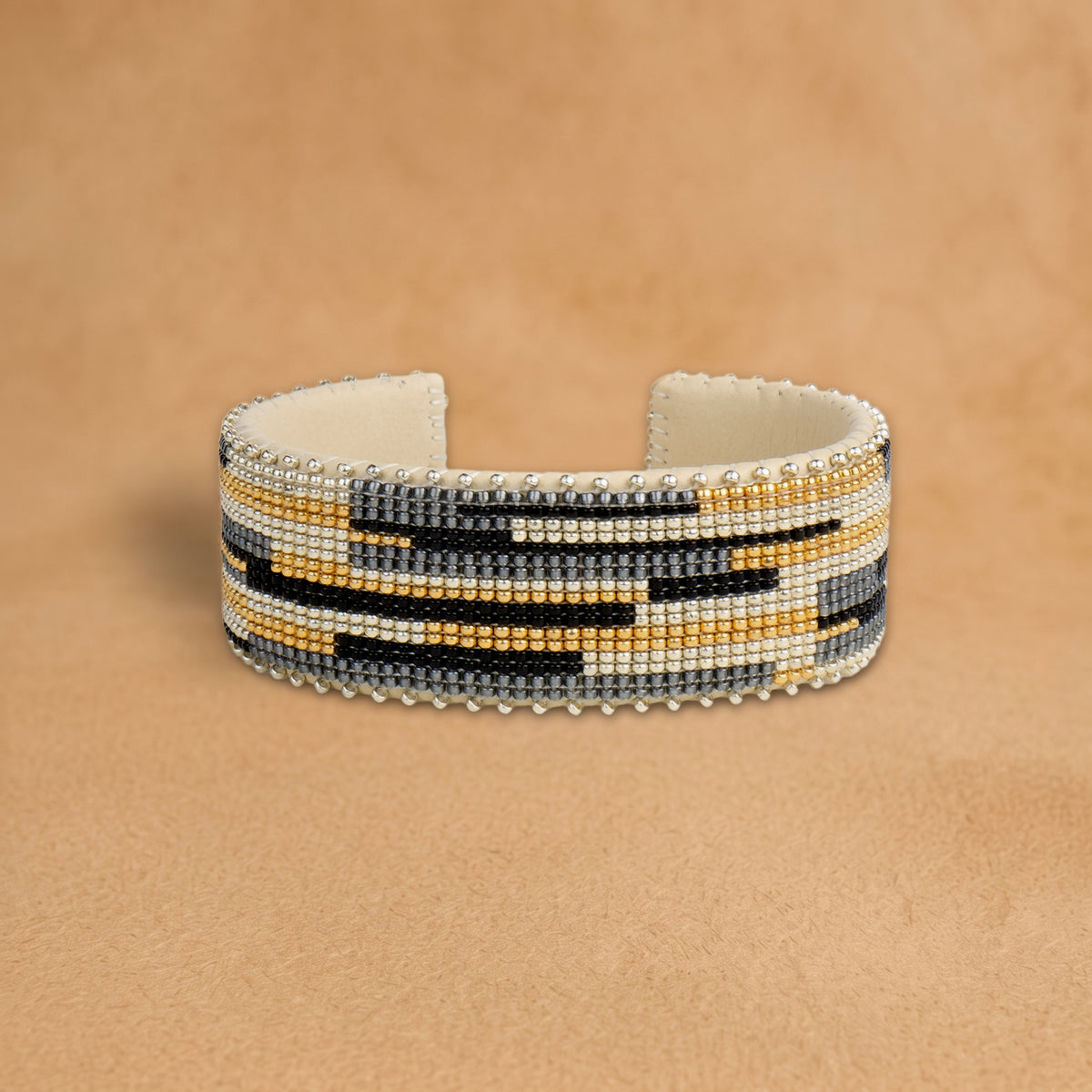 Kalani Large beaded cuff, cream, gold, black and grey offset bars, handloomed by Navajo artisans in New Mexico