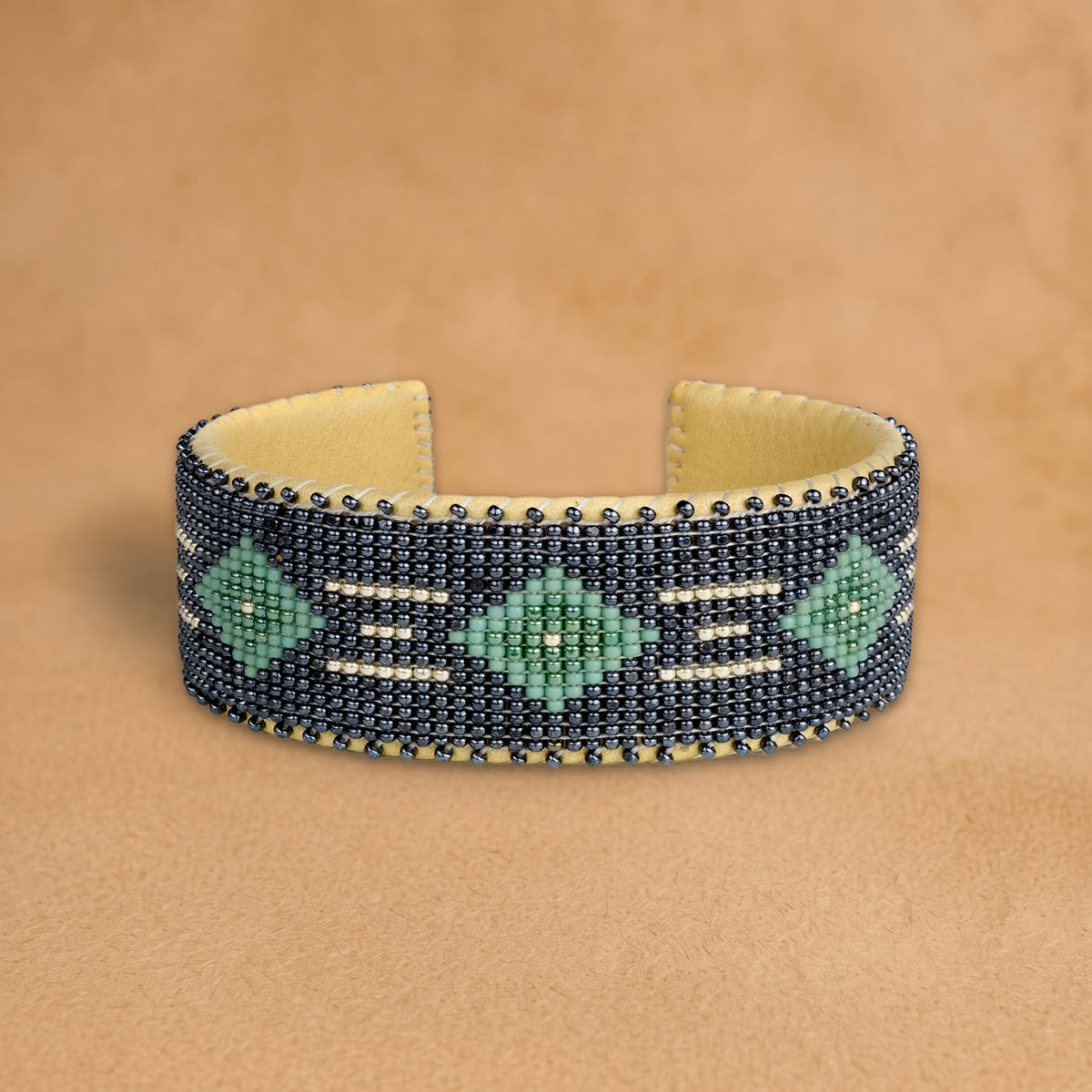 Kelly Green Large beaded cuff, navy with seafoam green diamonds and white dashes, handloomed by Navajo artisans in New Mexico