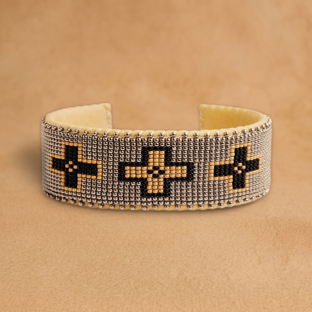 Maize Large beaded cuff, silver-grey with black and peach crosses, handloomed by Navajo artisans in New Mexico