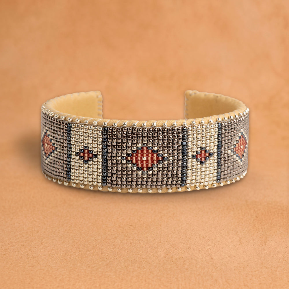 Mattie Large beaded cuff, silver and white panels with charcoal stripes and coral diamonds, handloomed by Navajo artisans in New Mexico