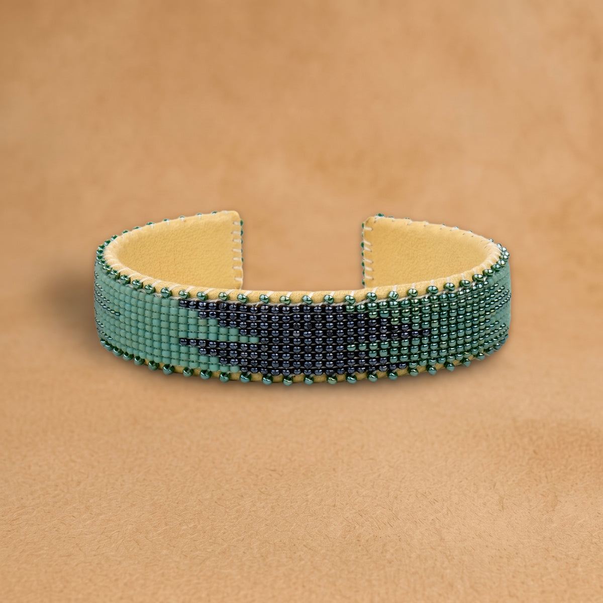 Ocean Small beaded cuff, teal green and navy flame pattern, handloomed by Navajo artisans in New Mexico