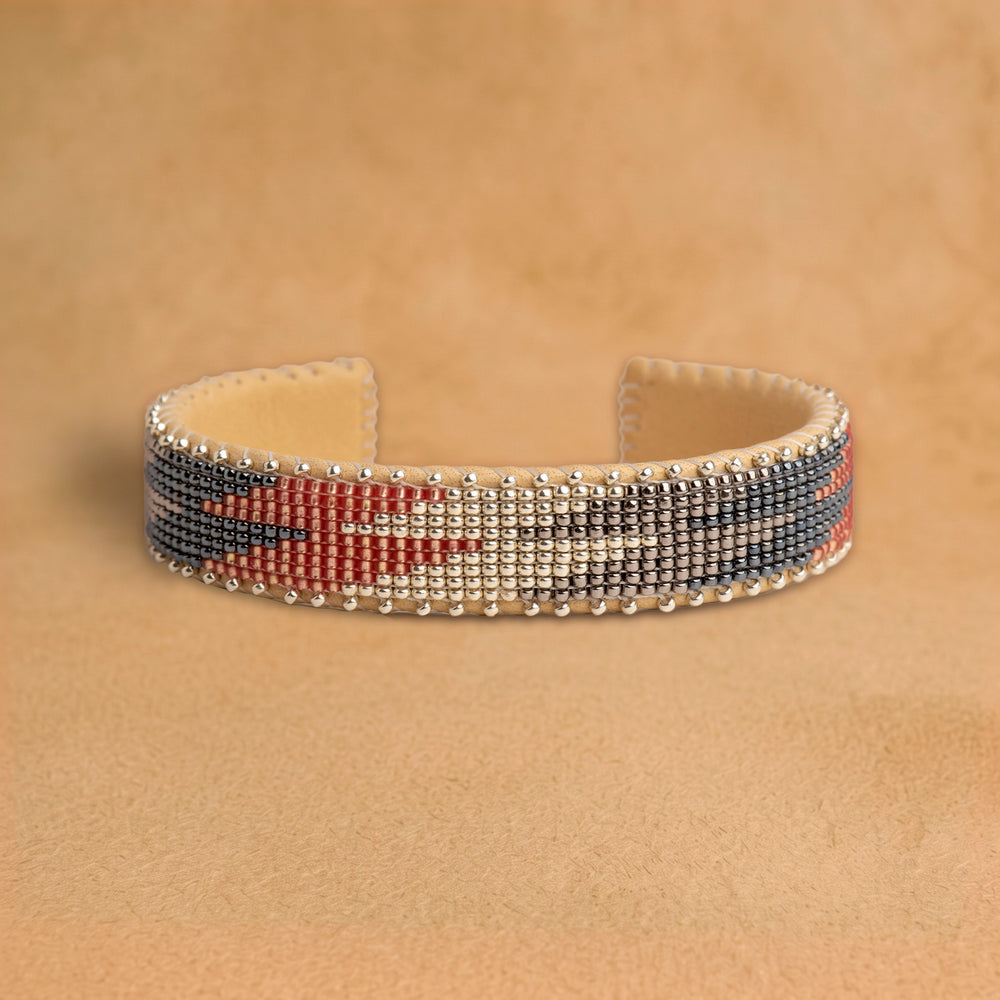 Olivia Small beaded cuff, charcoal, terracotta and silver flame pattern, handloomed by Navajo artisans in New Mexico