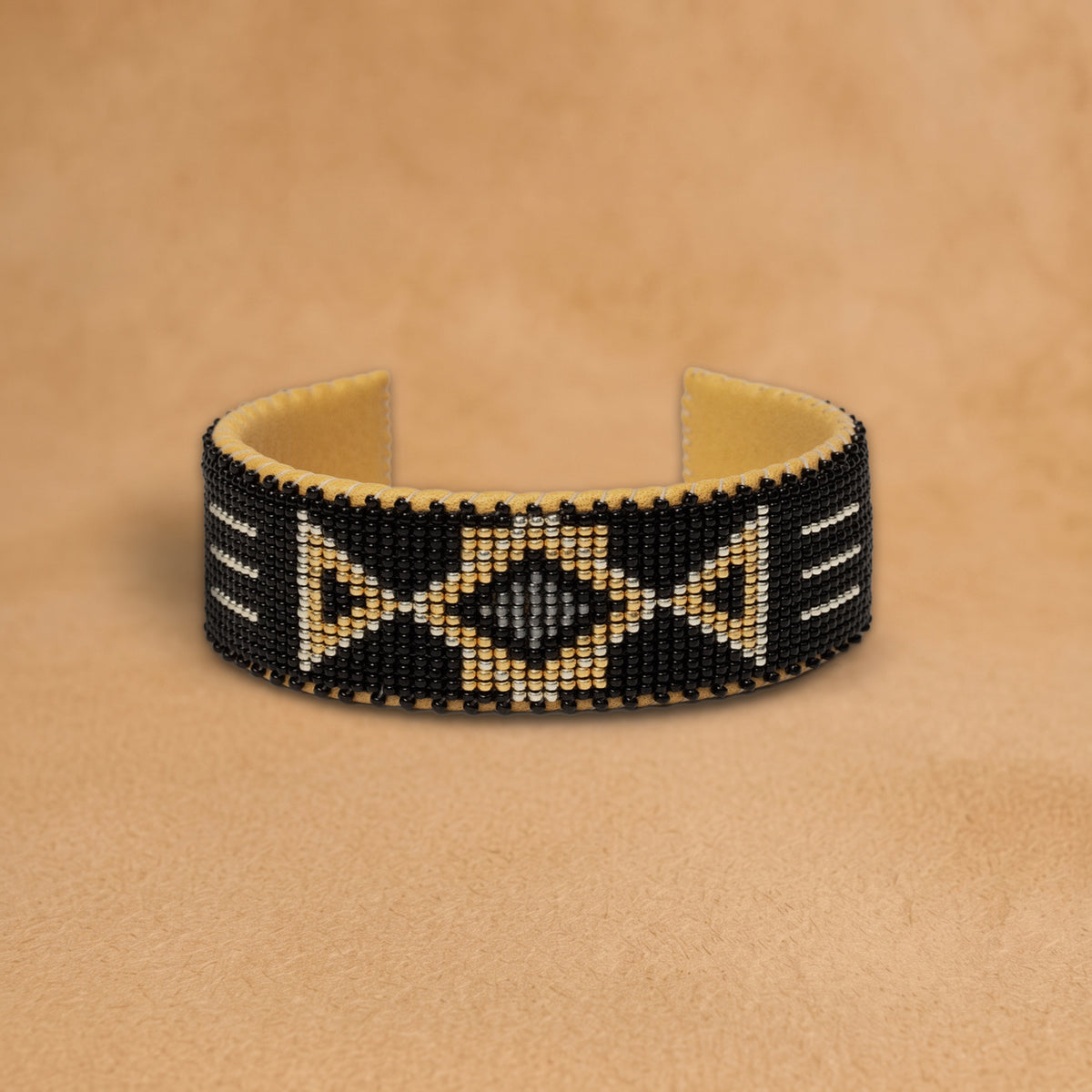 Raven Large beaded cuff, black with gold triangles and a grey diamond, handloomed by Navajo artisans in New Mexico