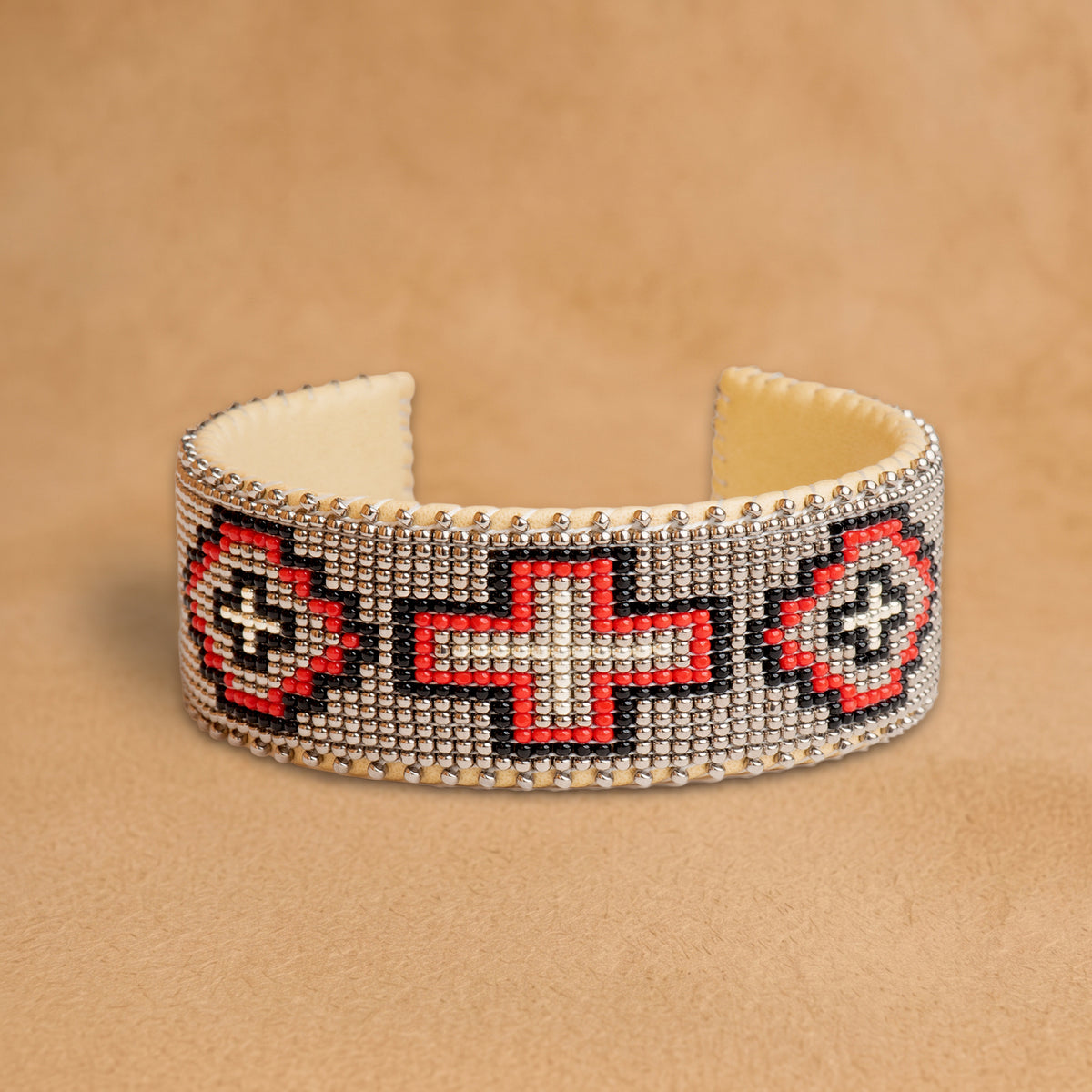 Rylee Large beaded cuff, silver-grey with red, black and white crosses, handloomed by Navajo artisans in New Mexico