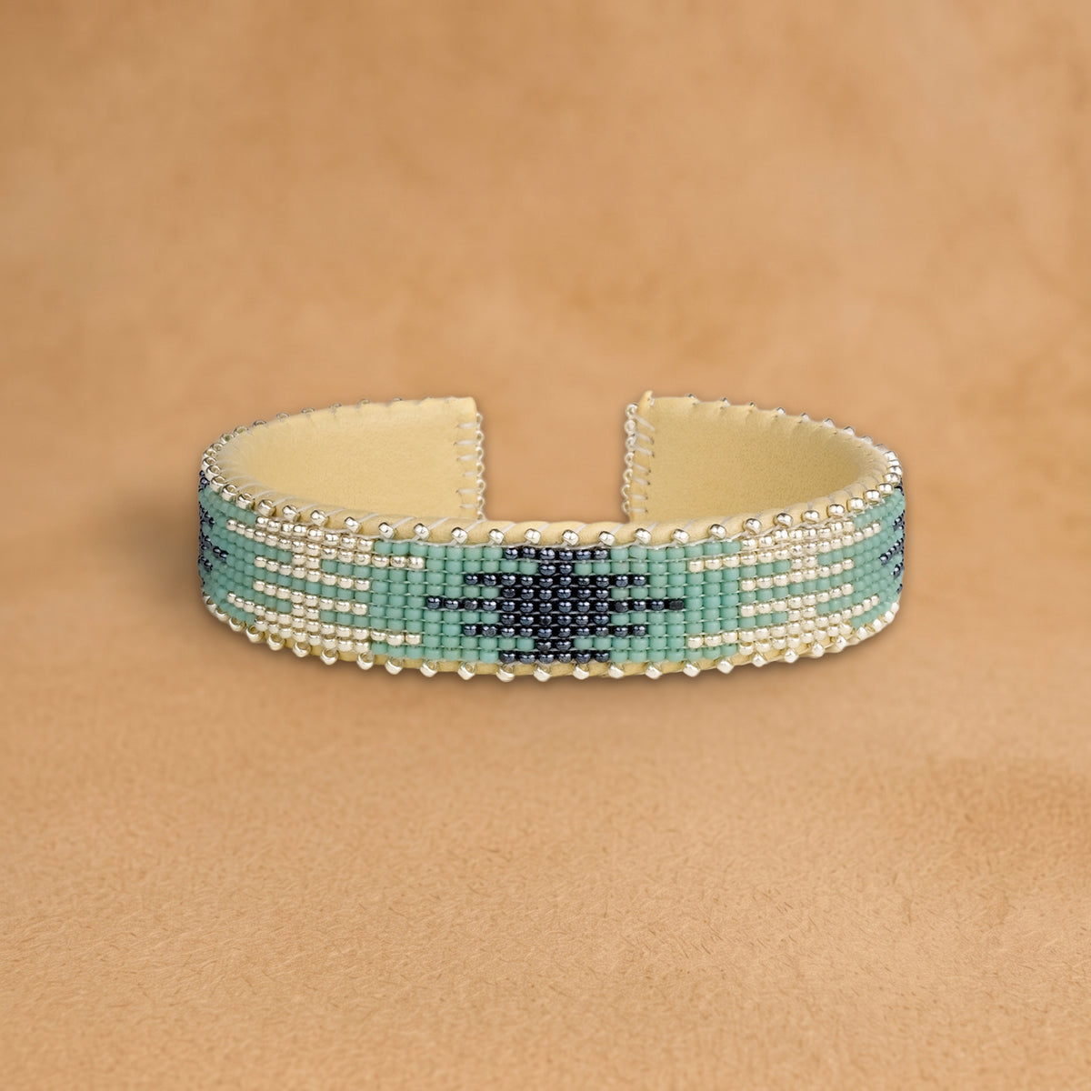 Summer Small beaded cuff, silver with a turquoise and navy arrow, handloomed by Navajo artisans in New Mexico