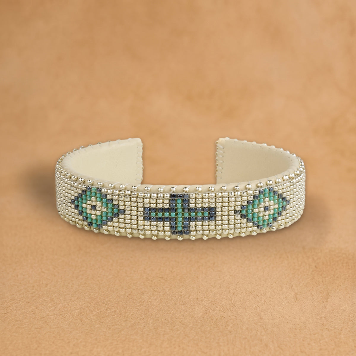 Theo Small beaded cuff, silver with turquoise and navy crosses and diamonds, handloomed by Navajo artisans in New Mexico
