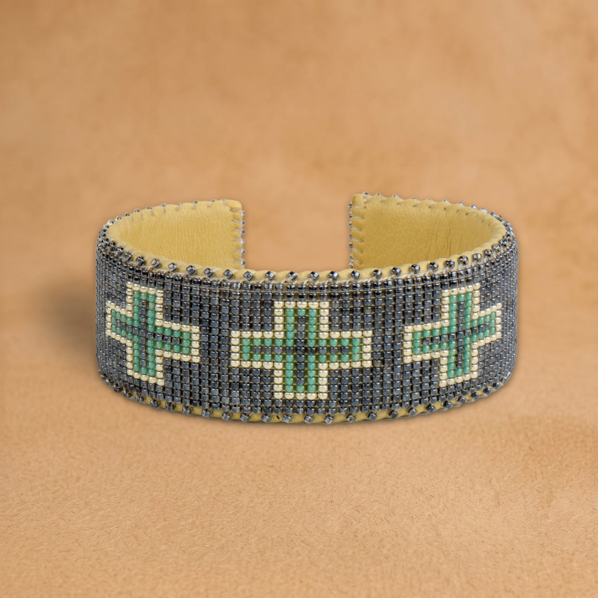 Tia Large beaded cuff, slate grey with turquoise and white crosses, handloomed by Navajo artisans in New Mexico