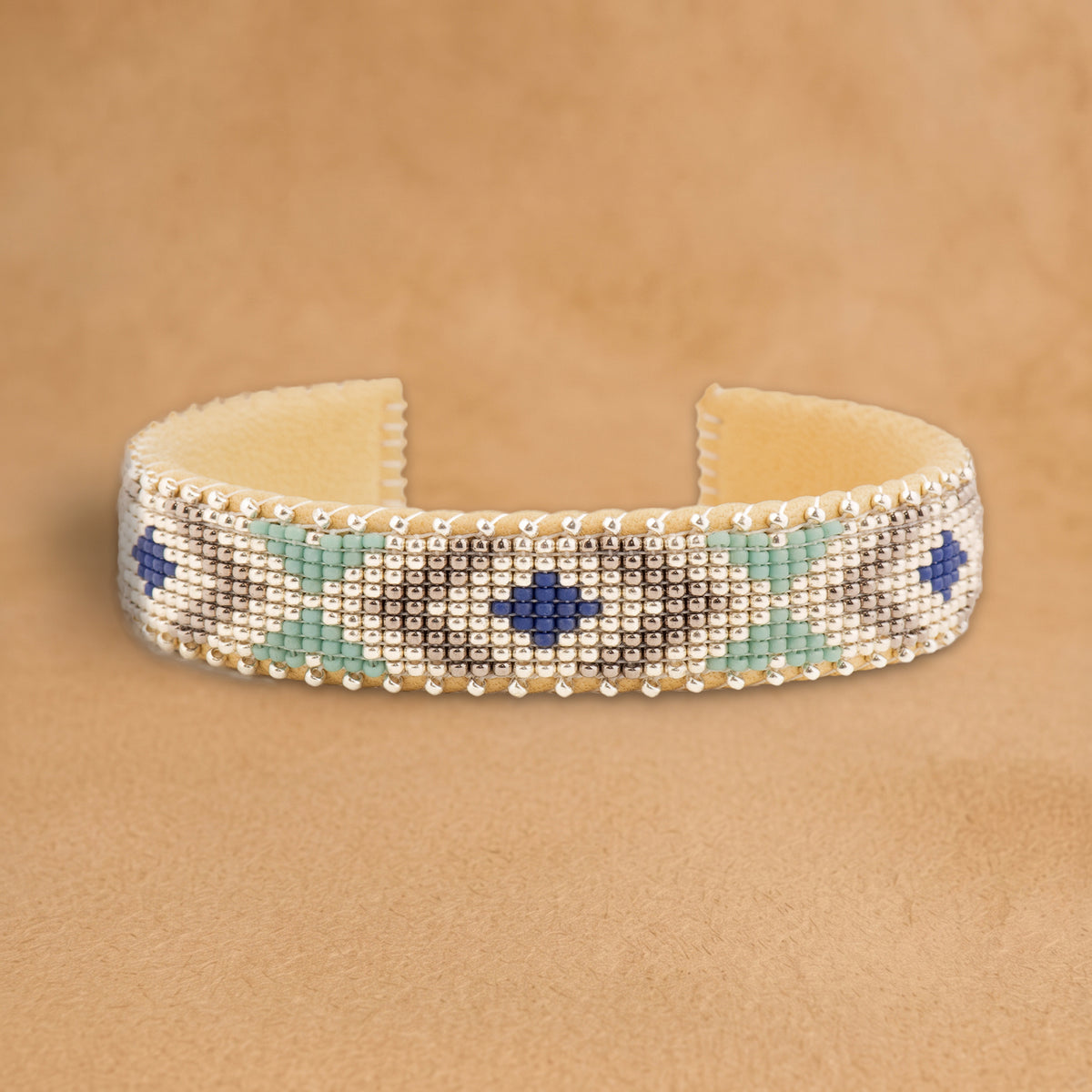Tó Small beaded cuff, silver with mint green, taupe and navy diamonds, handloomed by Navajo artisans in New Mexico
