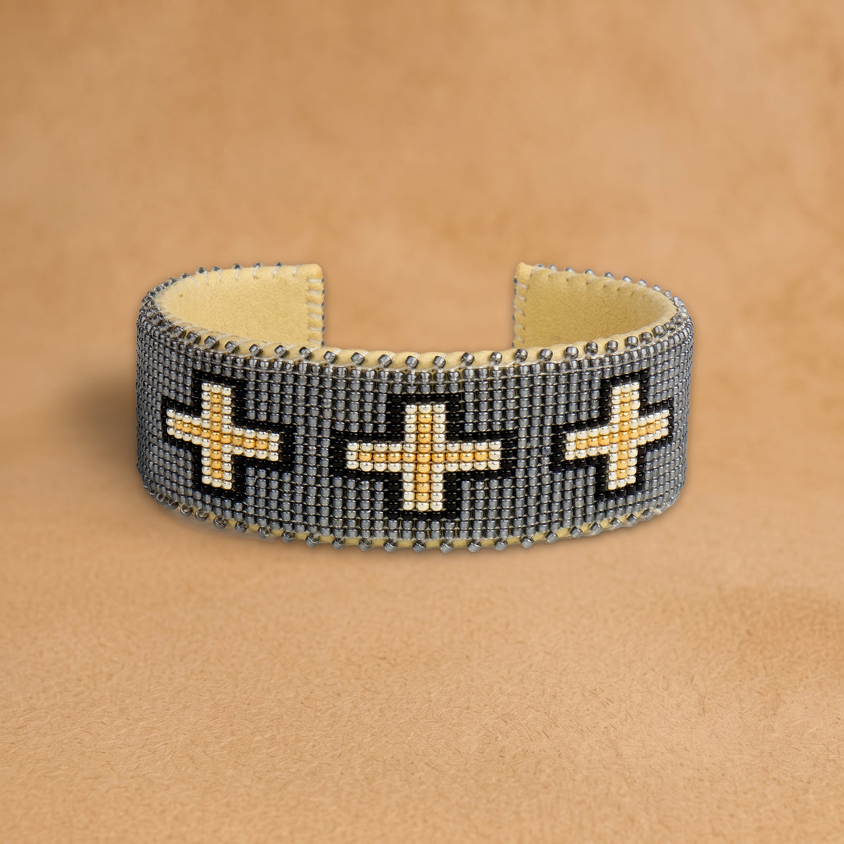 Zara Large beaded cuff, grey with black and gold crosses, handloomed by Navajo artisans in New Mexico