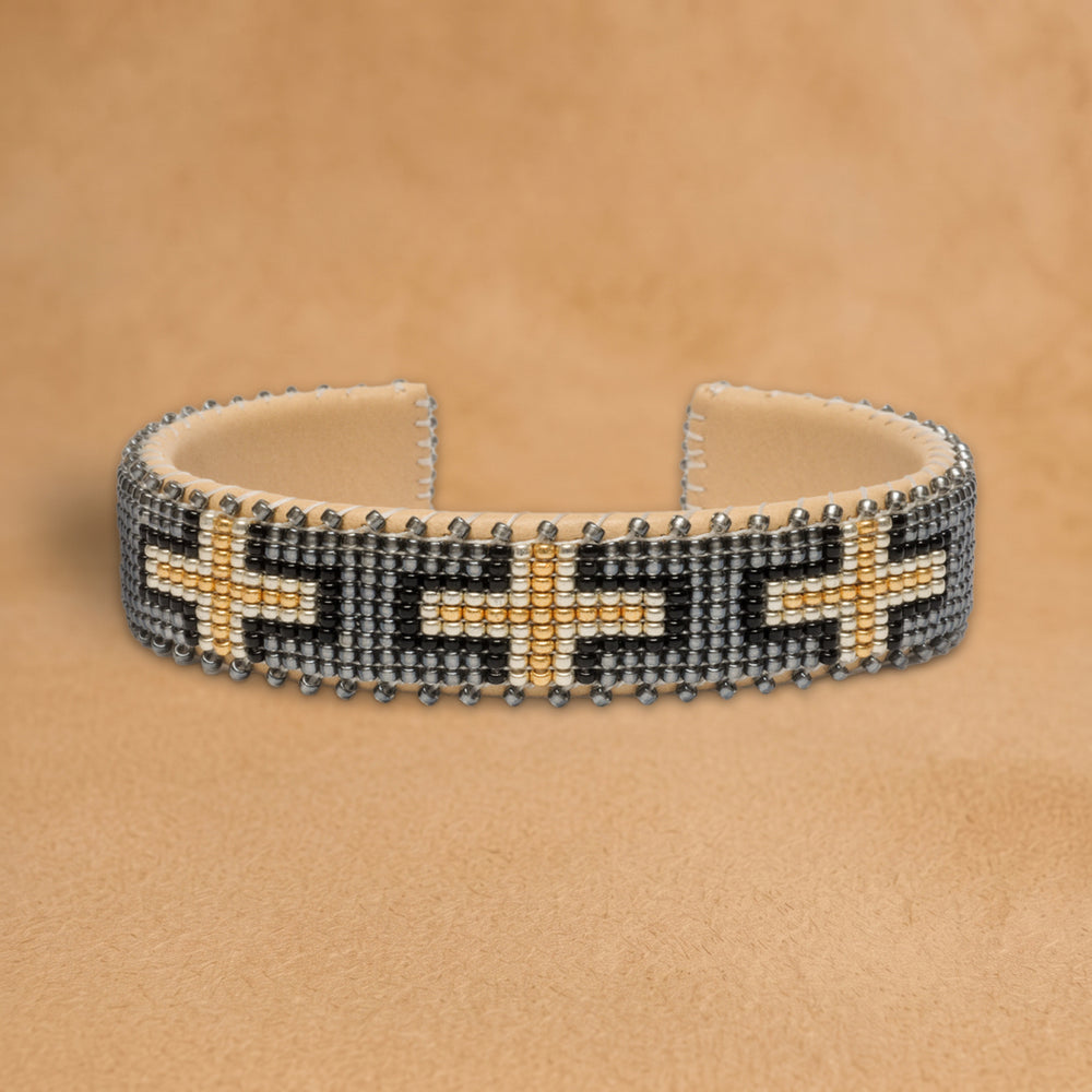 Zara Small beaded cuff, grey with black and gold crosses, handloomed by Navajo artisans in New Mexico