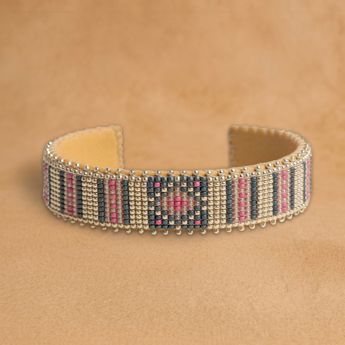 Zuri Medium beaded cuff, silver with charcoal and pink stripes and a center diamond, handloomed by Navajo artisans in New Mexico